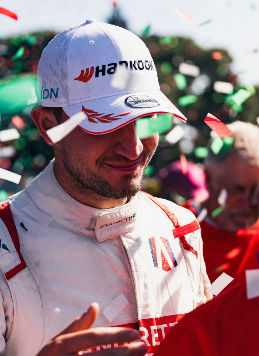 Confetti falling on a smiling driver